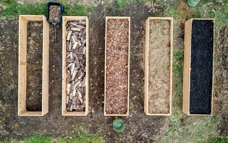 How to Build a Raised Garden Bed From Scratch Using Reclaimed Wood on a Small Budget